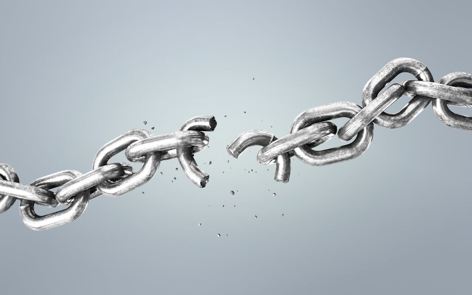 Broken chain symbolizing breaking silence