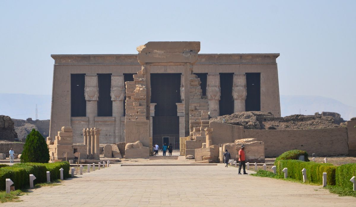 Entering Hathor’s Domain An impressive exterior shot of Dendera Temple with its massive entrance, highlighting its grandeur and ancient presence on our Spiritual Tour to Egypt