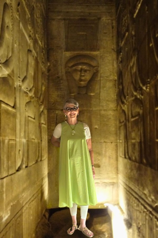 Carrying Hathor’s Message A modern photo of Dehyana in a green garment with Hathor in Dendera, Spiritual tour to Egypt