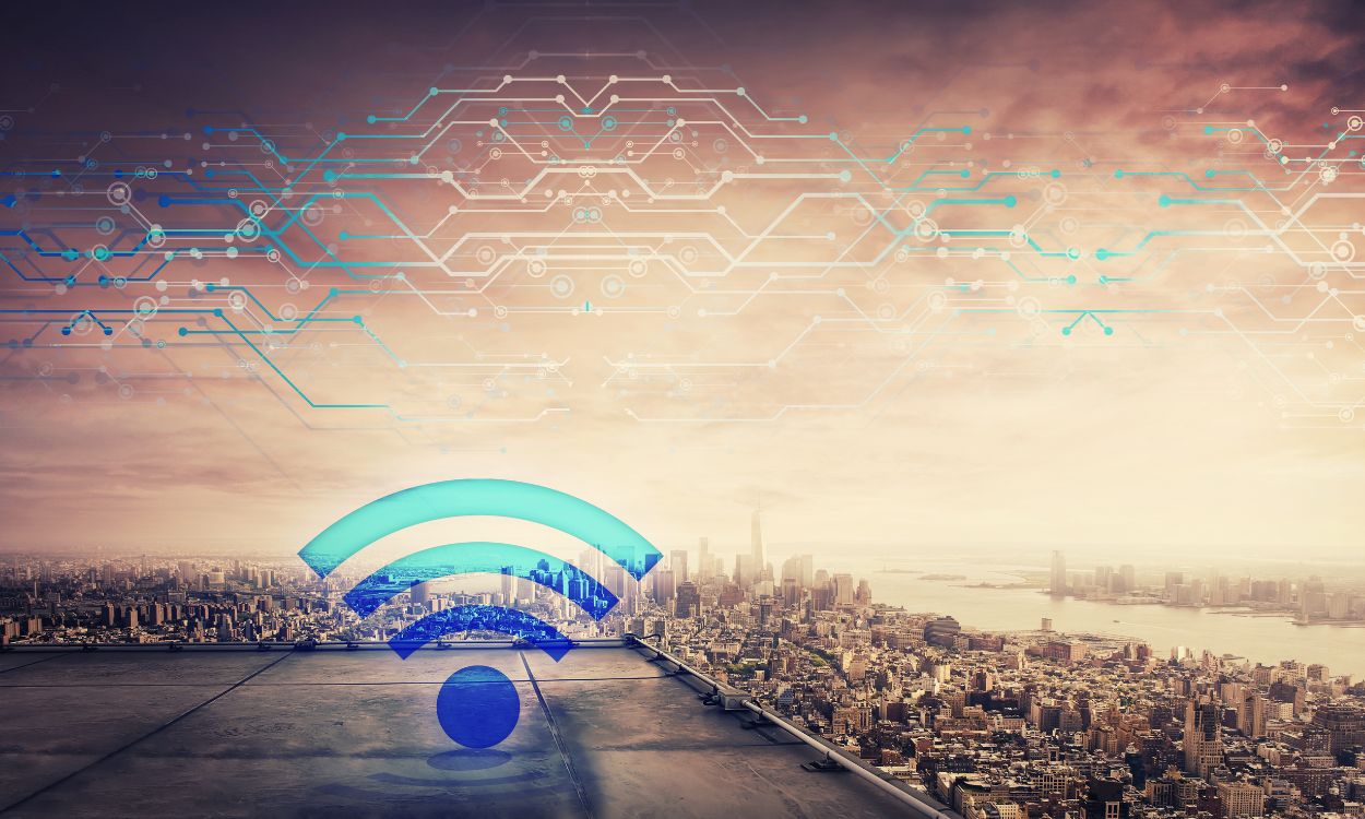 A hazy city with wifi signals overlaying the sky symbolising a left-brain world overrun by technology.