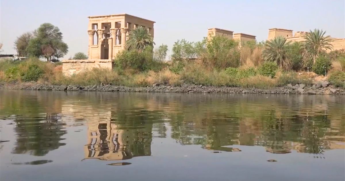Sacred Temples of Transformation Phila temple reflected in the water of the Nile