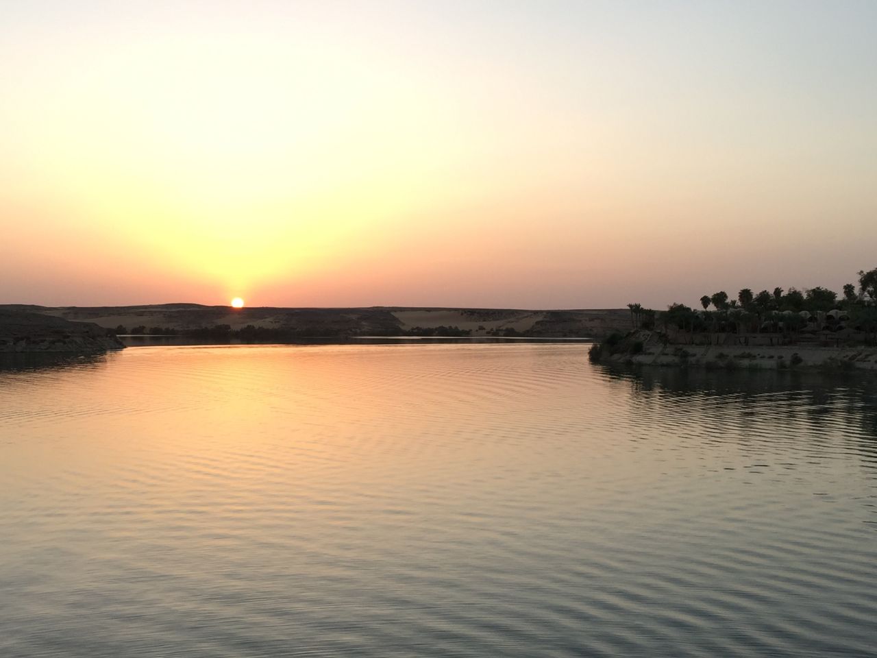 The Song of the Nile Calm waters of the Nile at Sunset