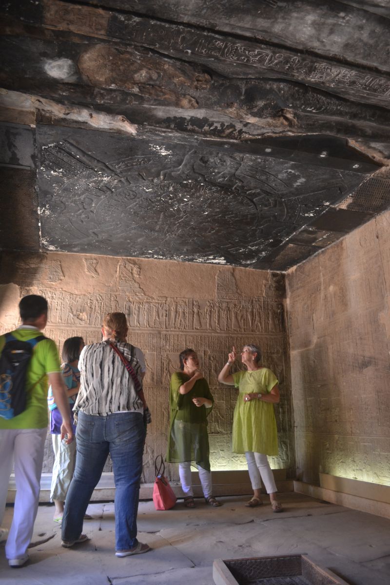 Dehyana teaching beneath the Dendera Zodiac inside the Temple of Hathor at Dendera, Egypt