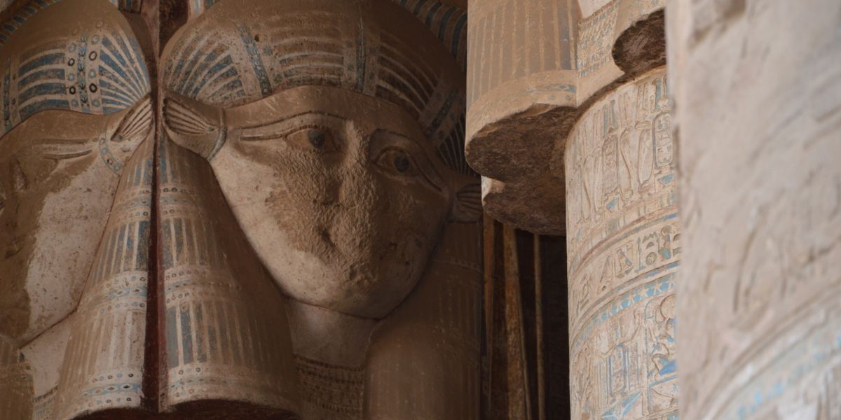 Hathor face carved into a column at the Temple of Hathor in Dendera, Egypt